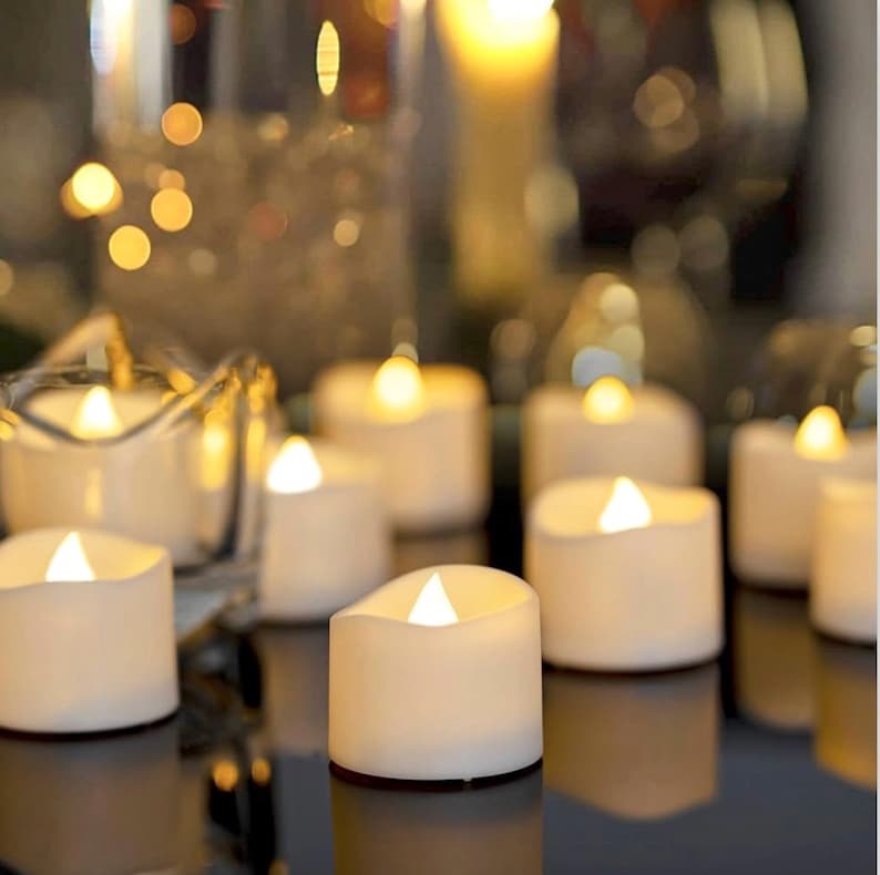 12-Pack Flameless LED Tea Lights Candles Battery Operated, Fake Electric Candles TeaLights  Centerpieces Table Decor,Wedding,Halloween Party