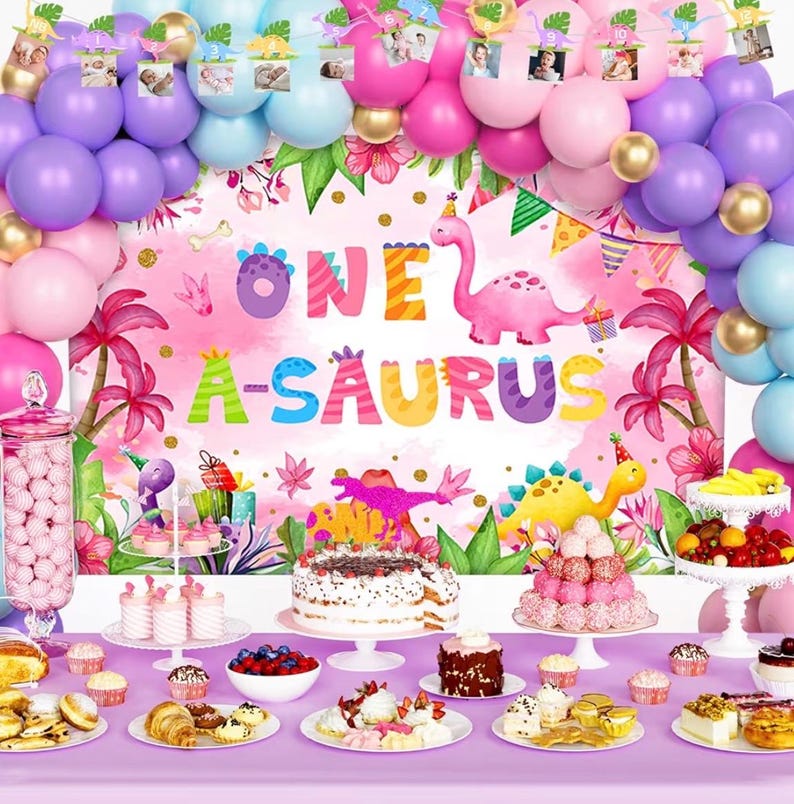 One a Saurus Birthday Decorations Pink Dinosaur Party Pack for 1st Birthday Girl, Includes Backdrop, Balloon Banner, Cake Topper, Box, Crown