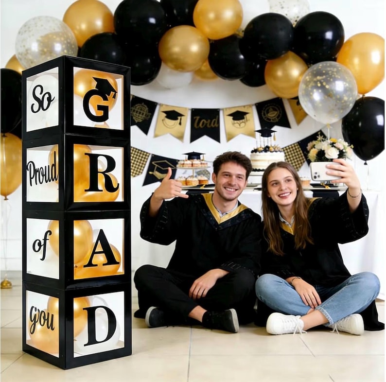 Graduation Decorations 2026 Set of 4 Boxes with 20pcs Balloons and Letters 2026 GRAD So Proud of You - Class of 2026 Party Supplies